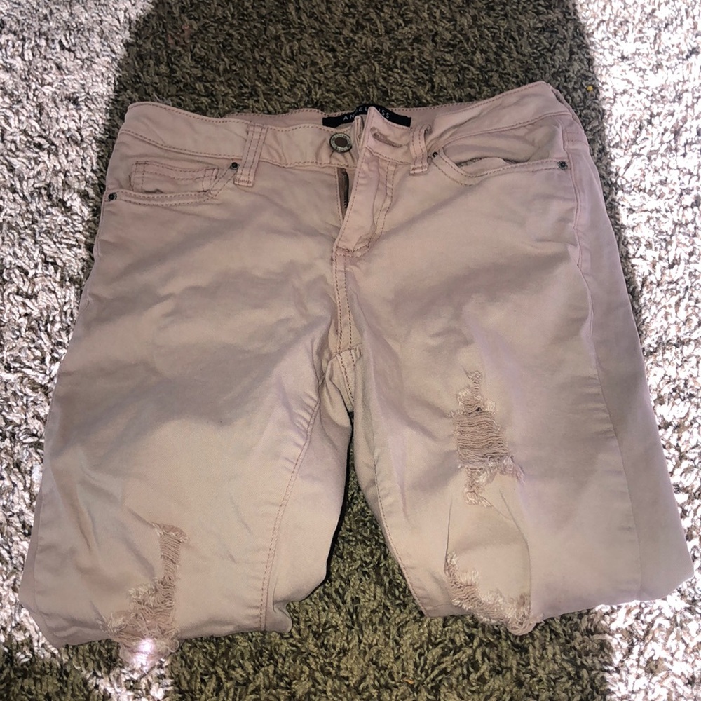 pink ripped jeans